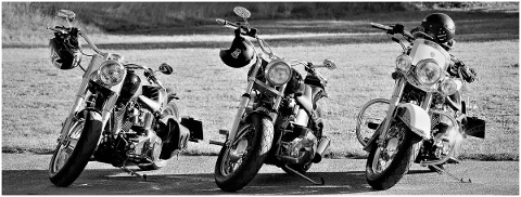 motorcycles-parking-three-helmets-5376060